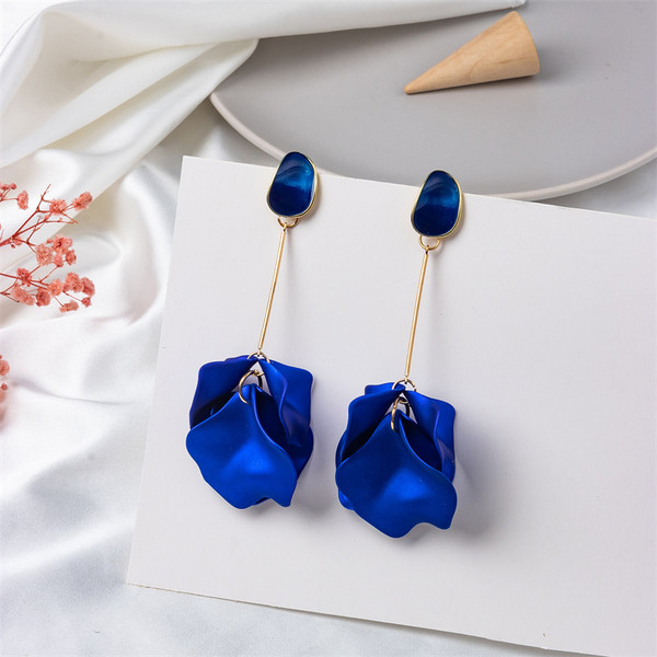 long earrings with saphire blue petals hung from gold coloured rod beneath an acrylic stud on s925 posts