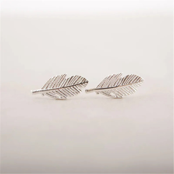 small feather design stud earring on posts - silver colour