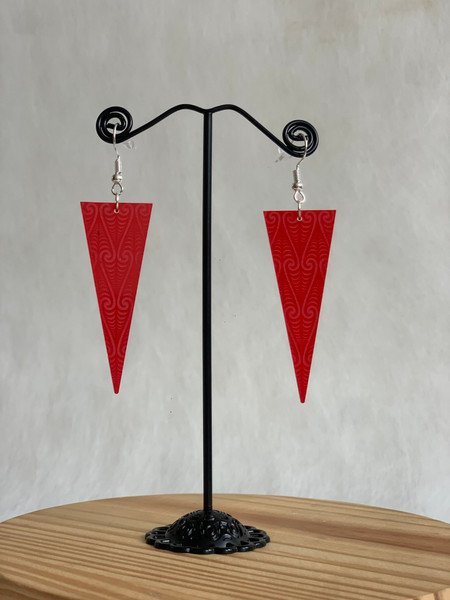Kowhaiwhai large triangle - red tinted acrylic hook earring