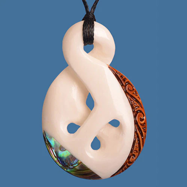 NZ Bone single twist pendant with Staining and NZ Paua accent