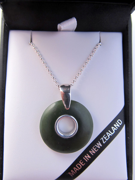 NZ Round doughnut shaped greenstone pendant (2.1cm) with silver inlay