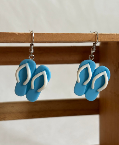 Blue pair of jandal earrings on hooks