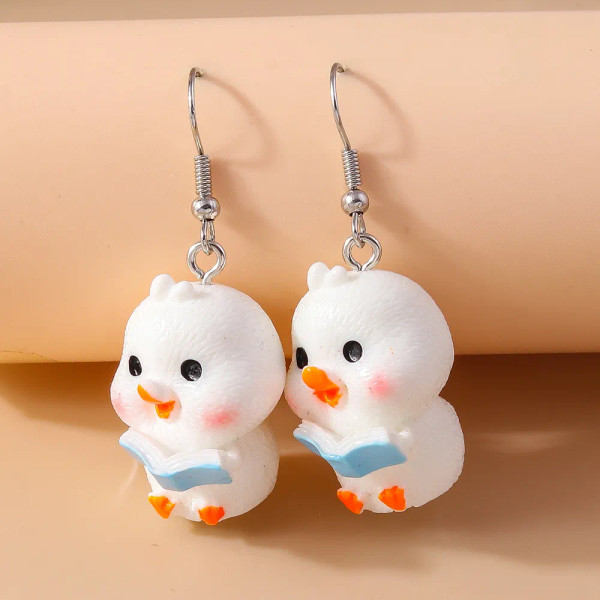 baby chicken with blue book earrings