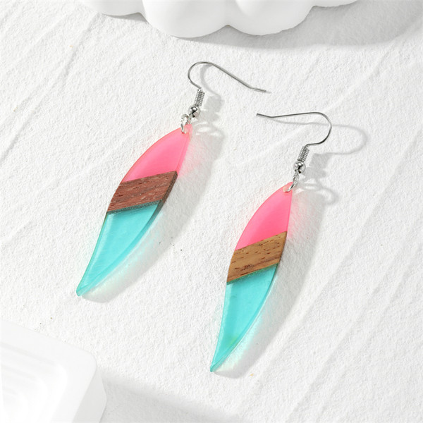 Pink and teal resin and wood earrings on hooks