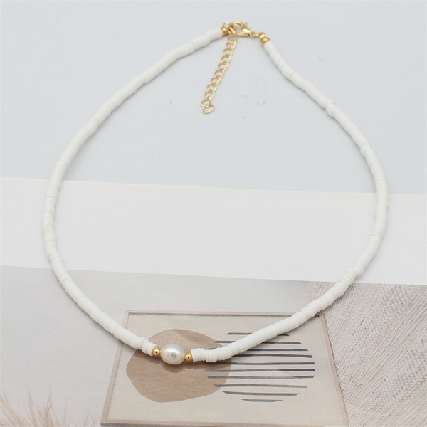 Threaded flat bead necklace with faux pearl - white
