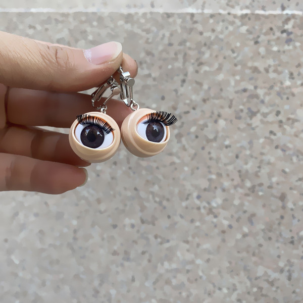 blinking eyeballs clp on earrings - comes with brown eyes or blue eyes”