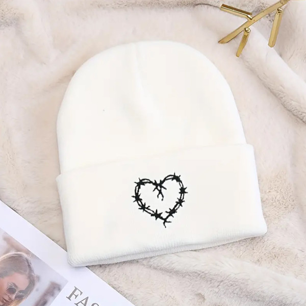 White beanie with embroided barbed wire heart