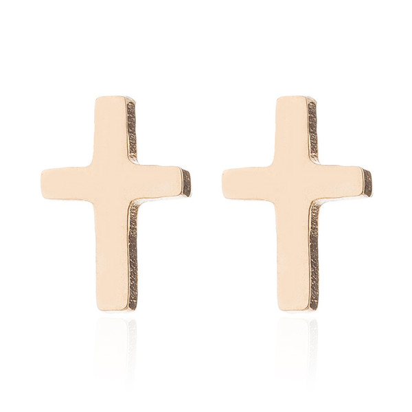 Small gold coloured cross stud