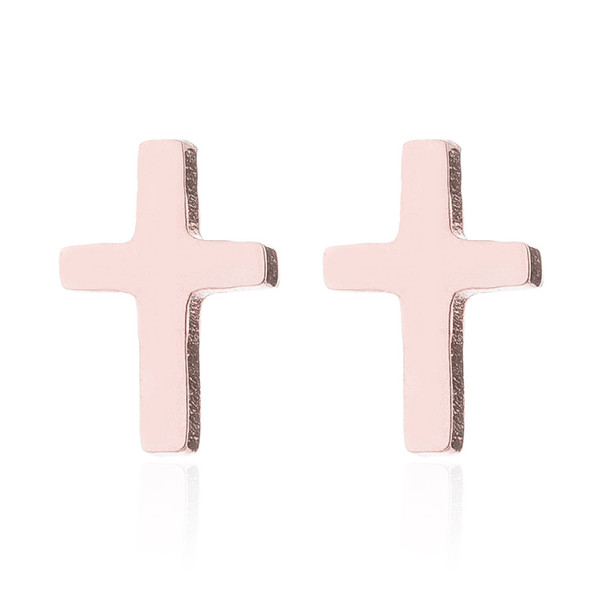 Small rose gold coloured cross stud