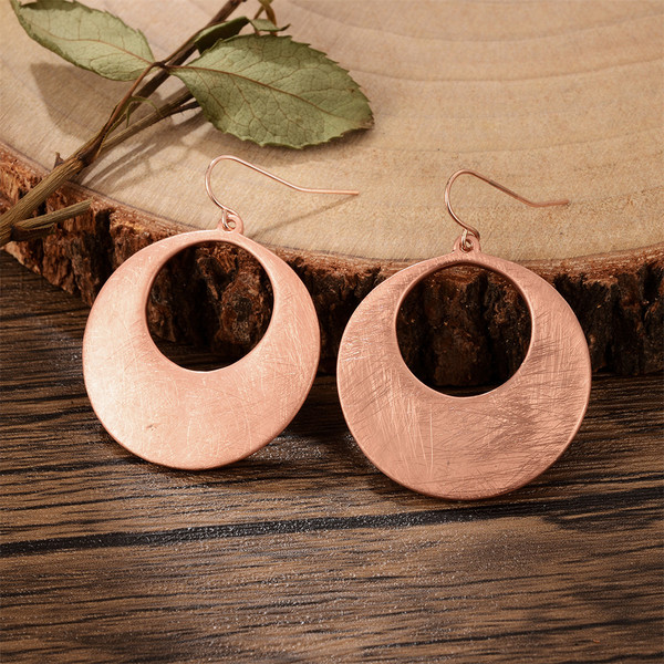 Textured look hammered metal hollow round earrings on hooks -rose  gold colour