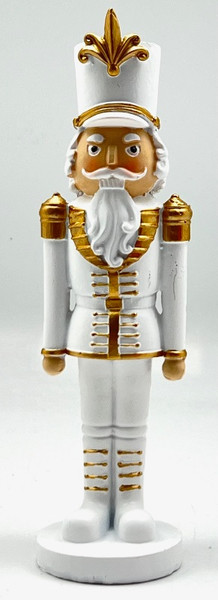Christmas nutcracker in white and gold uniform