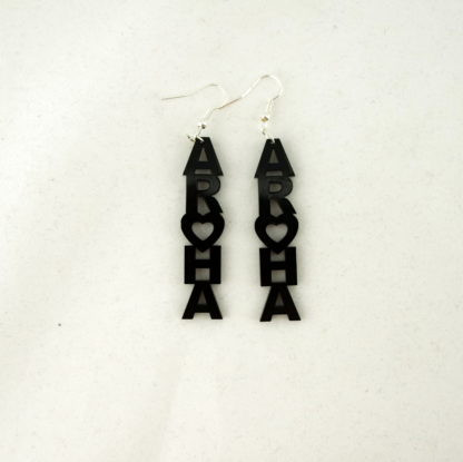 Dangly acrylic earrings with word Aroha
