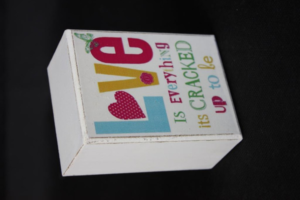 'Love is everything its cracked up to be' colourful cube