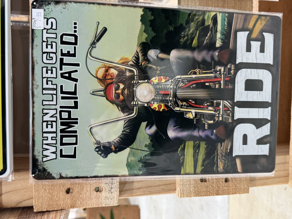 Retro tin sign-When life gets complicated ride