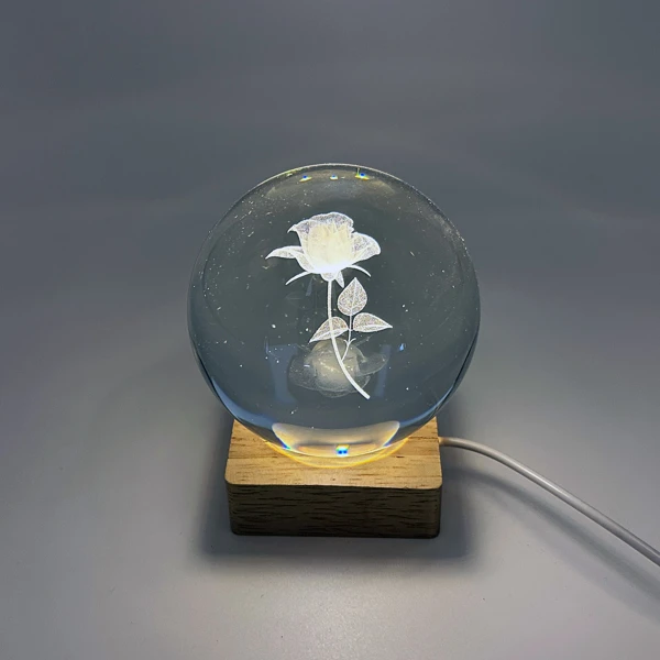 Single Rose etched in crystal ball on wooden base LED lamp on