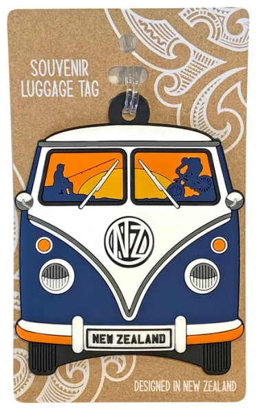 Navy blue NZ Kombi van souvenir luggage tag with orange windows and NEW ZEALAND plate on packaging