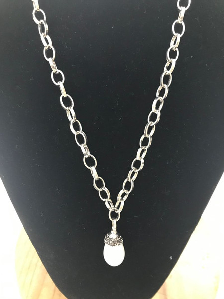 Teardrop style shell pearl pendant on 60cm long silver chain (comes black or cream)