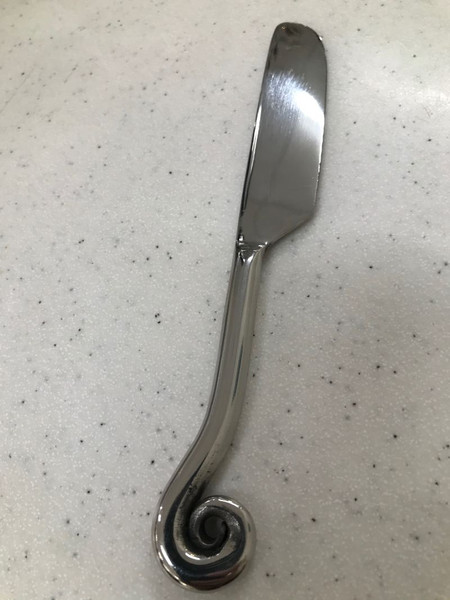 Pate knife with koru shaped handle