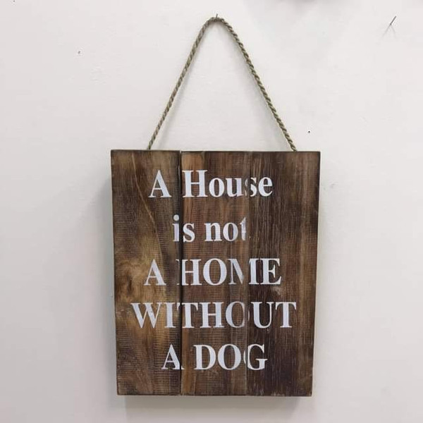 rustic wooden sign - a house is not a home without a dog