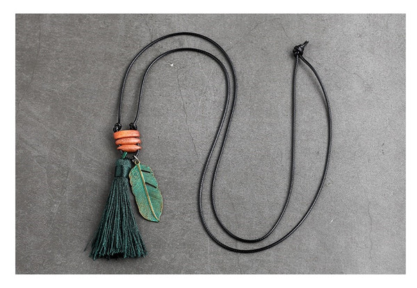 tassel and wooden bead with leaf on black cord (red tassel or green tassel)