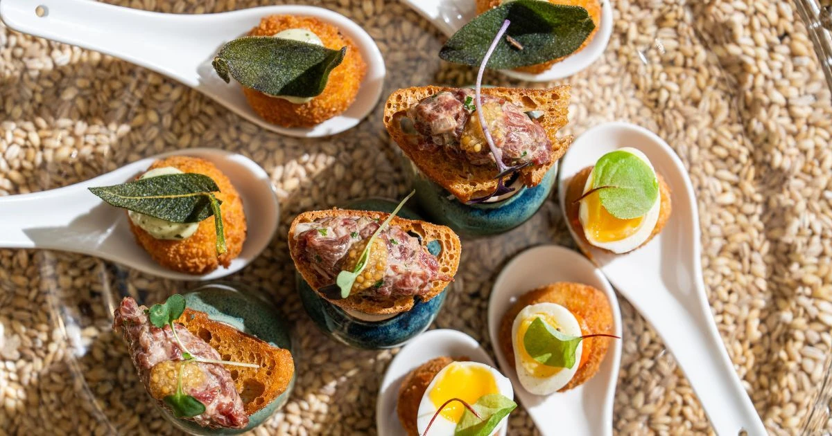 Canapés and party nibbles presented on CaterHire platters and buffetware