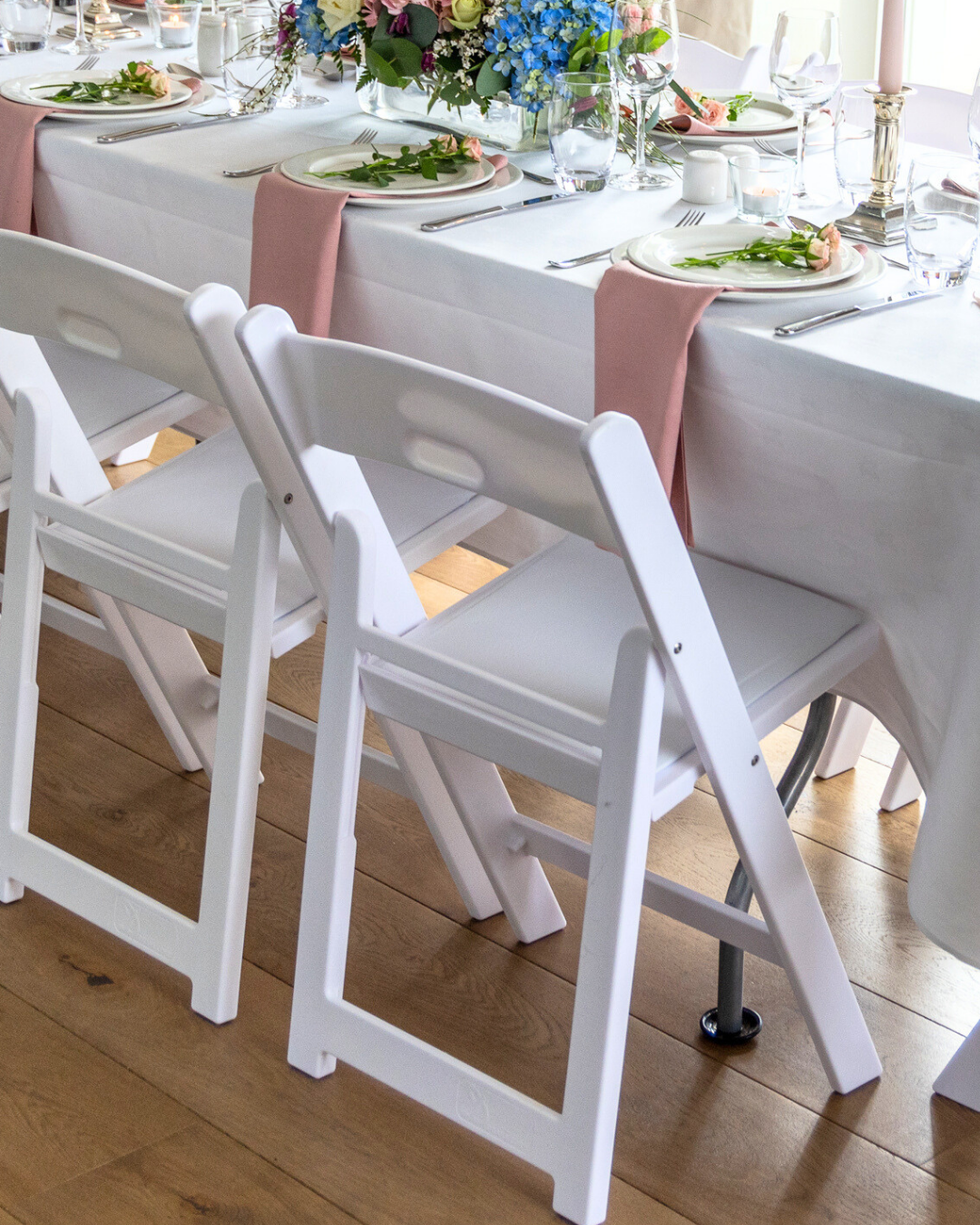 White folding chair, perfect to transport in car