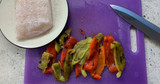 OLIVE OIL-POACHED HAKE AND BELL PEPPERS