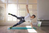 Actimove Sports Edition Back Support - with man stretching