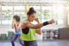 Actimove Sports Edition Wrist Support - with woman wearing while boxing