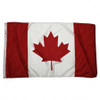 The Canada flag is a red and white vertical bicolor flag with a red maple leaf centered on the white band. Brass grommets are on the mounting side for easy and durable hanging.