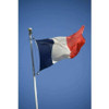 Outdoor French flag flown outdoors on a flagpole.