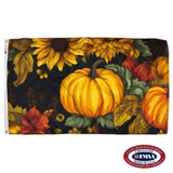 A black flag picturing an orange pumpkin, surrounded by sunflowers, leaves, and other pumpkins. FMAA Made in America seal.