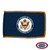 The indoor DOS flag is dark blue with a seal in the center depicting a bald eagle bearing an American flag shield on its chest.