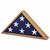 Oak finish flag case with folded American flag inside.