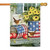 This house flag has planters on a porch, painted with the American flag. There are flowers in one and apples in the other. It also has a small bird sitting on top. This house flag has planters on a porch, painted with the American flag. There are flowers in one and apples in the other. It also has a small bird sitting on top.