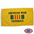 A Vietnam War Veteran flag. The field of the flag is yellow with a rectangle containing the Vietnam colors in the middle. "Vietnam War Veteran" is written in black around the rectangle. FMAA Certified Made in America seal. A Vietnam War Veteran flag. The field of the flag is yellow with a rectangle containing the Vietnam colors in the middle. "Vietnam War Veteran" is written in black around the rectangle. FMAA Certified Made in America seal.