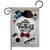 A beige garden flag with a centered white circle that says "Happy Father's Day." Around circle is a black hat, red bowtie, glasses, mug, watch, mustache, comb, and folded shirt.