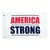 A nylon white flag that says AMERICA is STRONG in all capital letters. The word AMERICA is red and is above the word STRONG is blue. A nylon white flag that says AMERICA is STRONG in all capital letters. The word AMERICA is red and is above the word STRONG is blue.