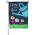 A Grow with Love Watering Can Garden Flag depicting a blue watering can above a field of flowers with the text "Grow with love" on the left.