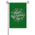 A green St. Patrick's Day garden flag with a background filled with shamrocks. The middle says "Happy St. Patrick's Day" in white embellished with swirls and shamrocks.
