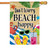 A house flag depicting a beach with a towel, flipflops, sunglasses, crab, and drink with the text "Don't Worry, Beach Happy" above.