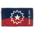 The Juneteenth flag features a red and blue field. The center has a white outline of a 12-pointed star with a solid white 5-pointed star in the middle.