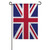 A United Kingdom garden flag on a flagpole. The UK flag features a large white-outlined red cross, with a smaller red X-shape behind it on a dark blue background.