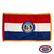 The indoor Missouri flag has 3 sides of gold fringe around the 3 horizontal red, white, and blue stripes. In the center is the state seal. FMAA Certified Made in America seal.