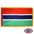 The indoor Gambia flag has 3 sides of gold fringe around a red, blue, and green tricolor. The blue stripe has white outlines above and below. FMAA Certified Made in America seal. The indoor Gambia flag has 3 sides of gold fringe around a red, blue, and green tricolor. The blue stripe has white outlines above and below. FMAA Certified Made in America seal.