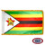The indoor Zimbabwe flag has 3 sides of fringe around 7 green, yellow, red & black stripes. On the left is a white triangle with a bird. FMAA Certified Made in America seal. The indoor Zimbabwe flag has 3 sides of fringe around 7 green, yellow, red & black stripes. On the left is a white triangle with a bird. FMAA Certified Made in America seal.