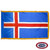 The indoor Iceland flag has 3 sides of gold fringe around a dark blue field. In the center is a red Nordic cross with a white outline. FMAA Certified Made in America seal.