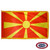 The indoor Macedonia flag has 3 sides of gold fringe around a red field with a yellow sun in the center and 8 long rays. FMAA Certified Made in America seal.