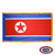 The indoor North Korea flag has 3 sides of fringe around five blue, white, & a wide red stripe. On the left is a red star in a white circle. FMAA Certified Made in America seal.