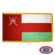The indoor Oman flag has 3 sides of gold fringe around a white, red, and green tricolor. On the left is a red field with the national emblem. FMAA Certified Made in America seal.